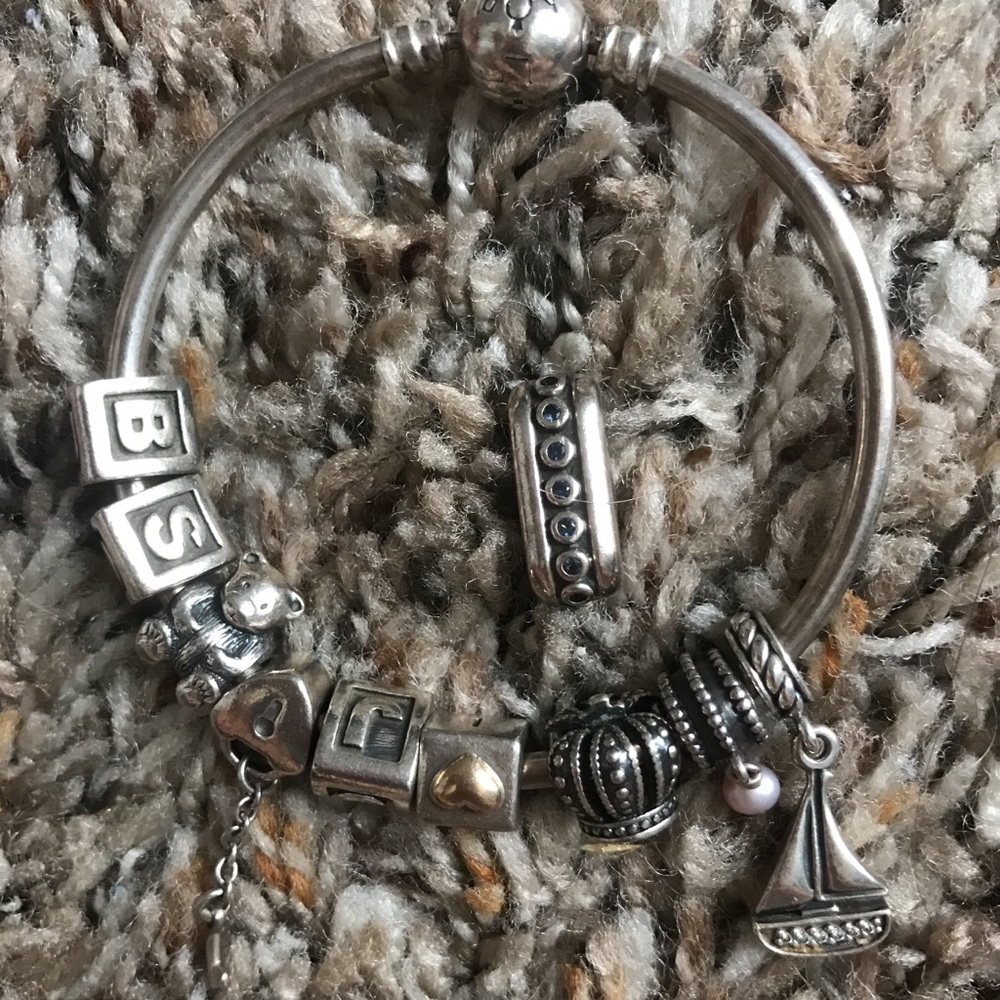 Pandora bracelet with 9 charms and Connector